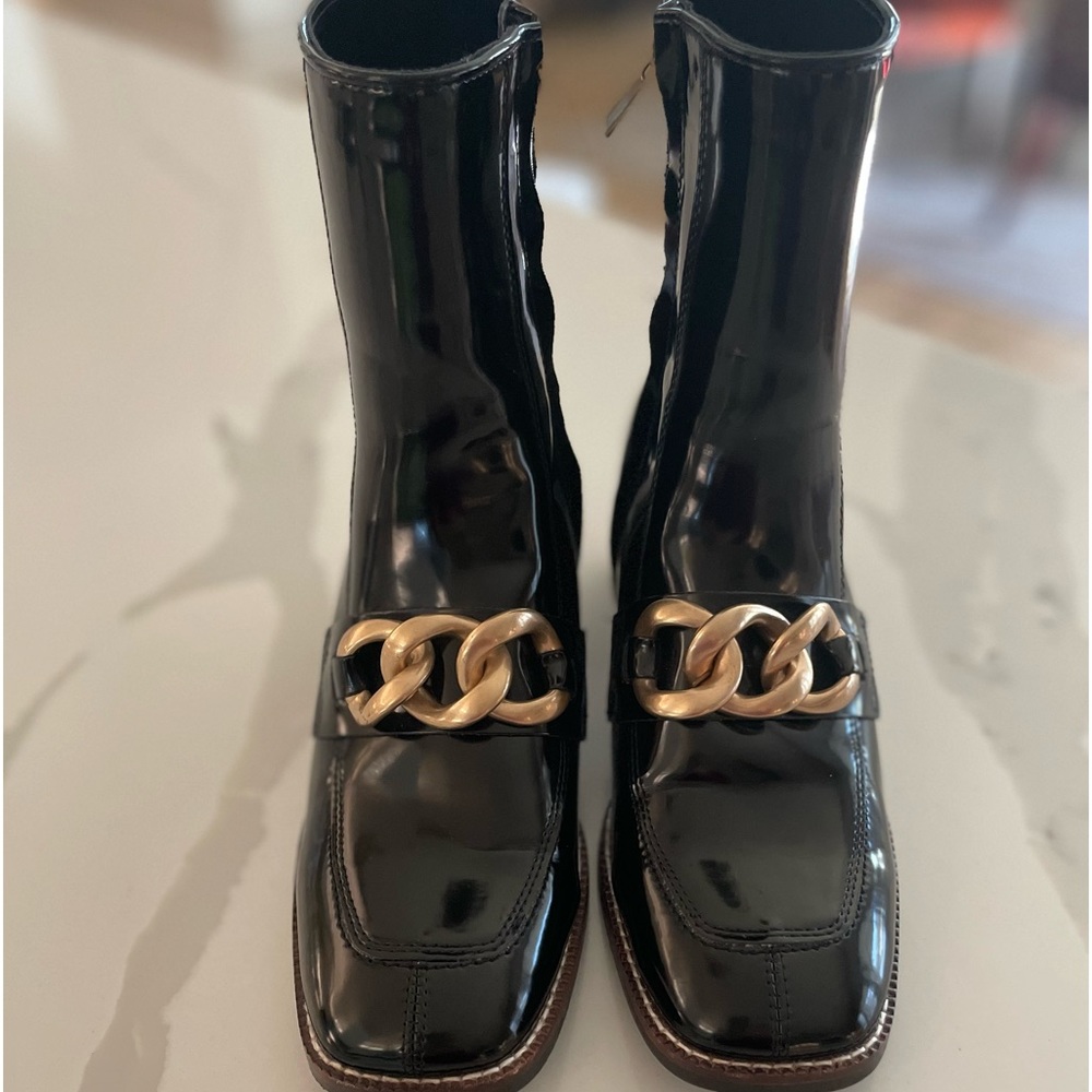 Zip up booties- Steve Madden size 8. Great condition.  Gold accents